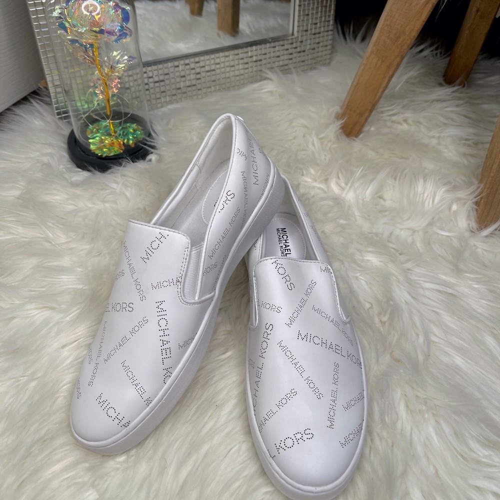 Michael Kors’ printed all over Slip On. <333
